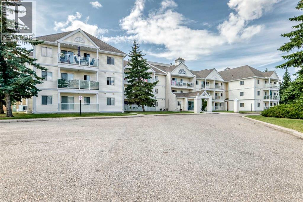 307, 309 Woodside Drive Nw, Airdrie, Alberta  T4B 2E7 - Photo 3 - A2330737