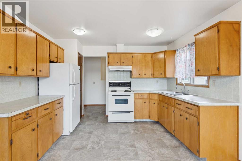 6215 Rundlehorn Drive NE, Calgary, Alberta  T1Y 1M6 - Photo 4 - A2331714