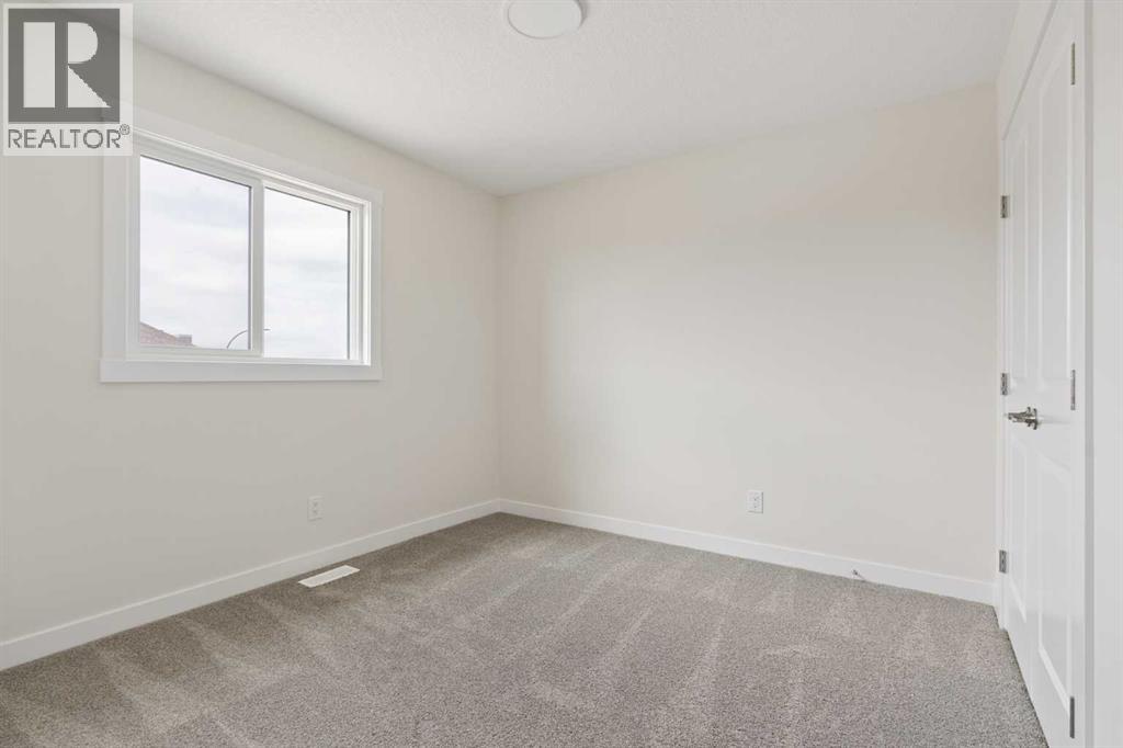 120 Creekstone Circle SW, Calgary, Alberta  T2X 5M6 - Photo 32 - A2309344