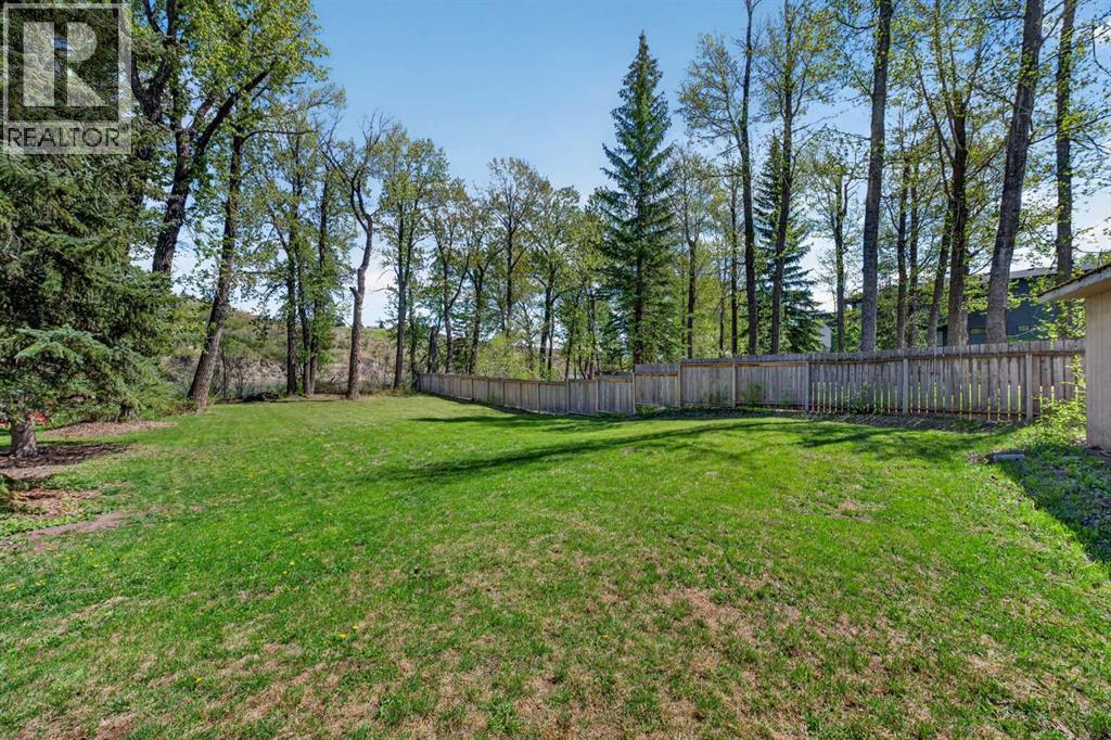 7136 Bow Crescent NW, Calgary, Alberta  T3B 2B9 - Photo 5 - A2313639
