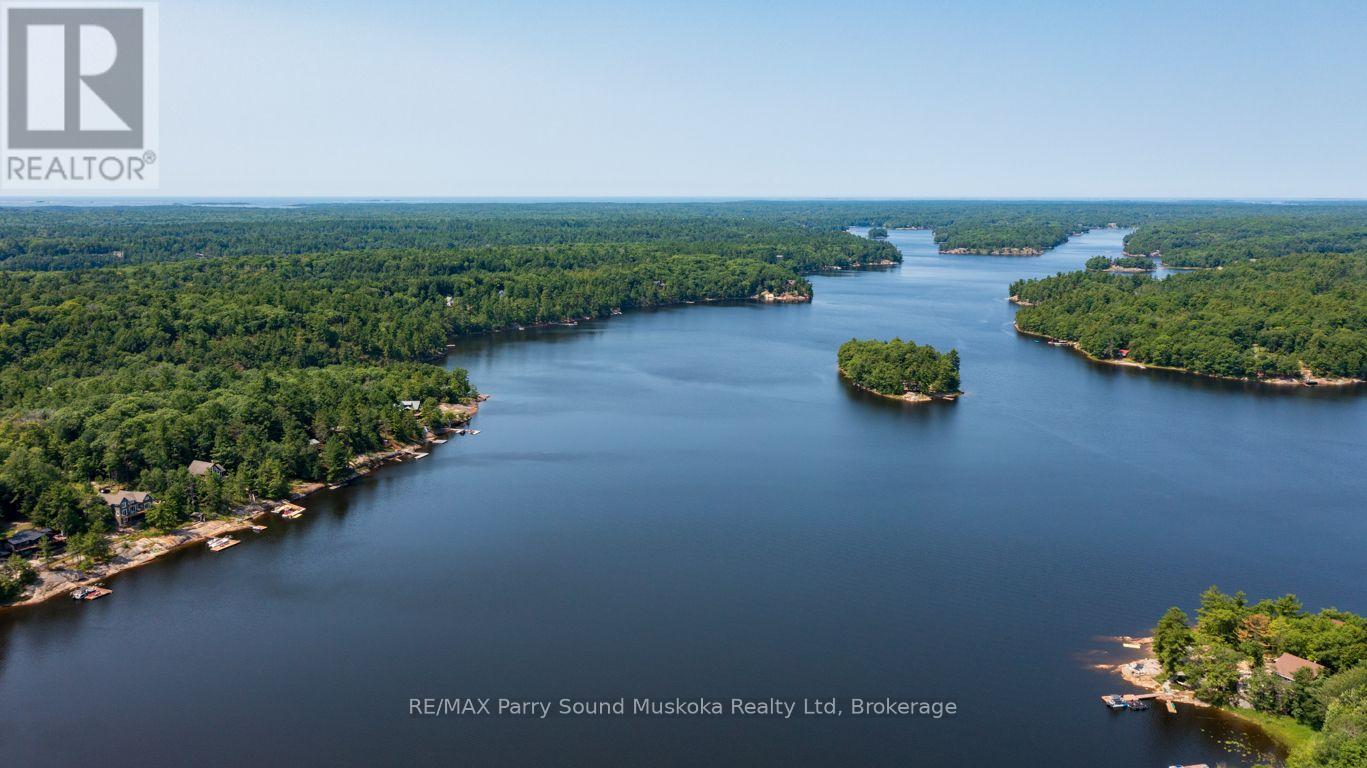 45 Ridgeway Drive, Carling, Ontario  P0G 1G0 - Photo 5 - X12888708