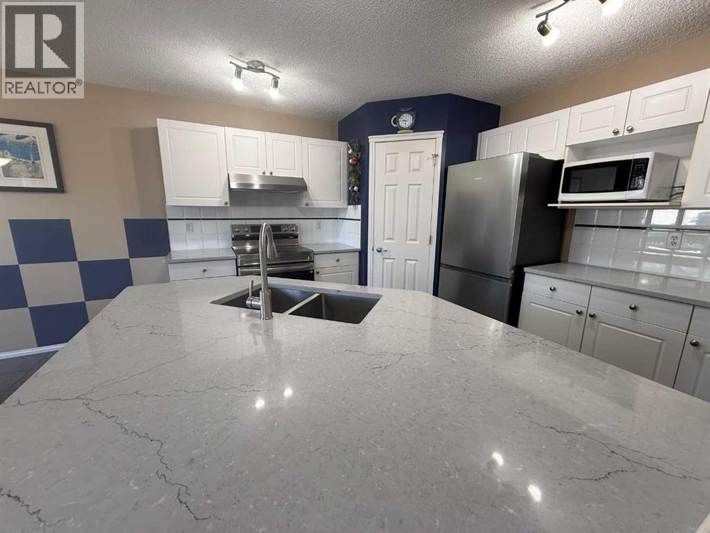 15 Saddletree Drive Ne, Calgary, Alberta  T3J 5C7 - Photo 15 - A2313777