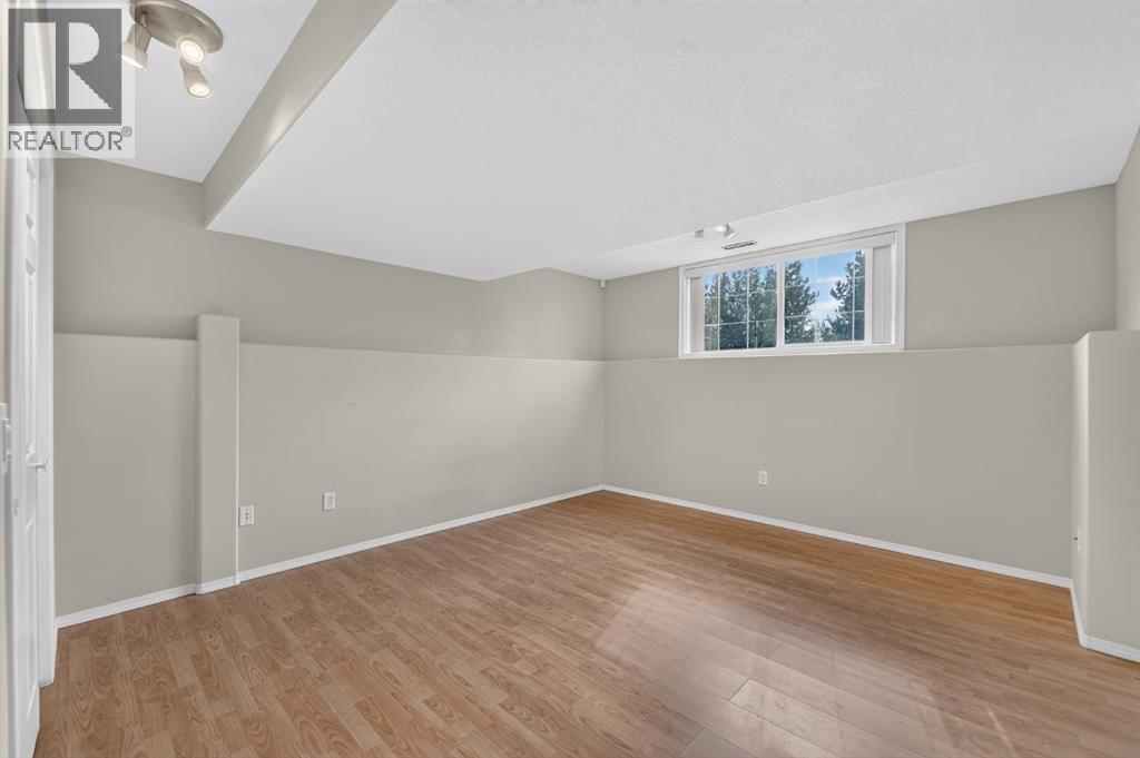 6 Meadow Ridge Bay, Conrich, Alberta  T1Z 0J2 - Photo 40 - A2332751