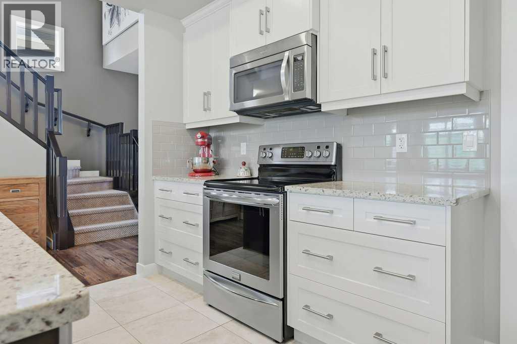 27 Jumping Pound Terrace, Cochrane, Alberta  T4C 0K2 - Photo 7 - A2329766