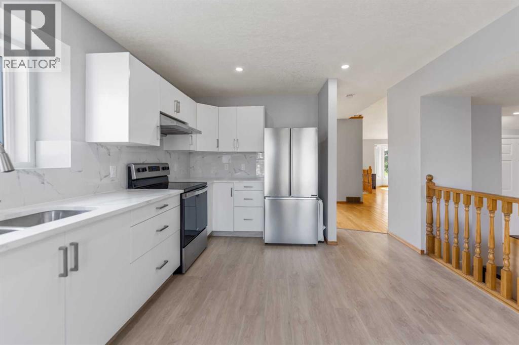 226 Sandstone Drive NW, Calgary, Alberta  T3K 3B9 - Photo 31 - A2331972