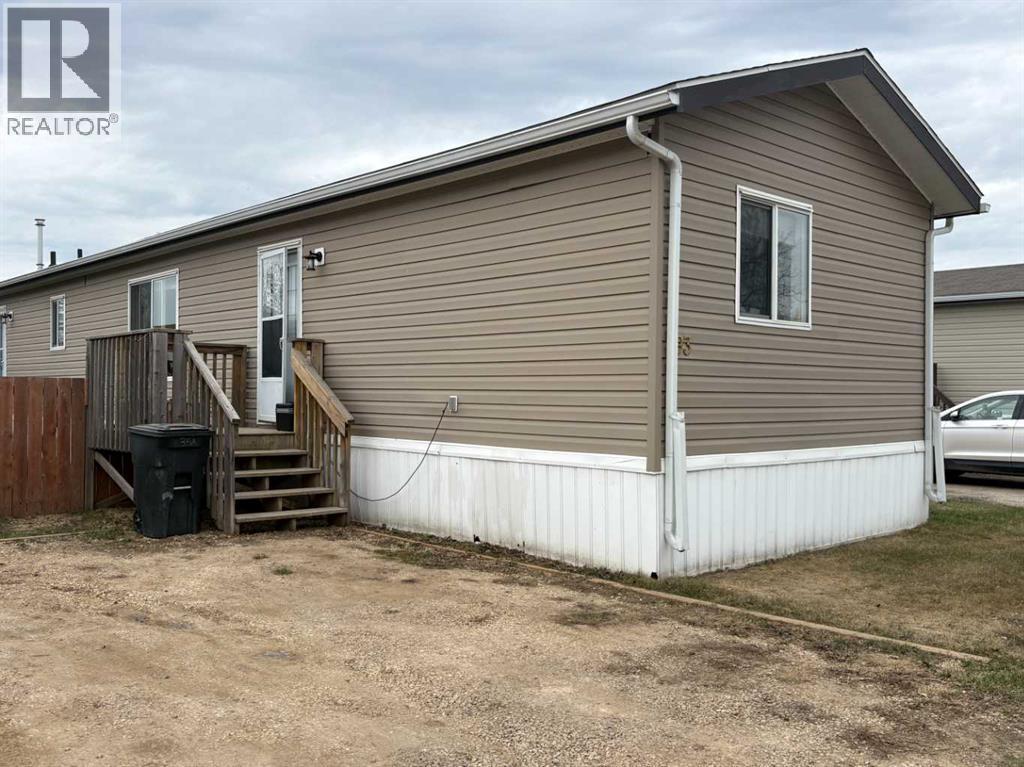 93, 404 6 Avenue Nw, Slave Lake, Alberta  T0G 2A1 - Photo 1 - A2311349