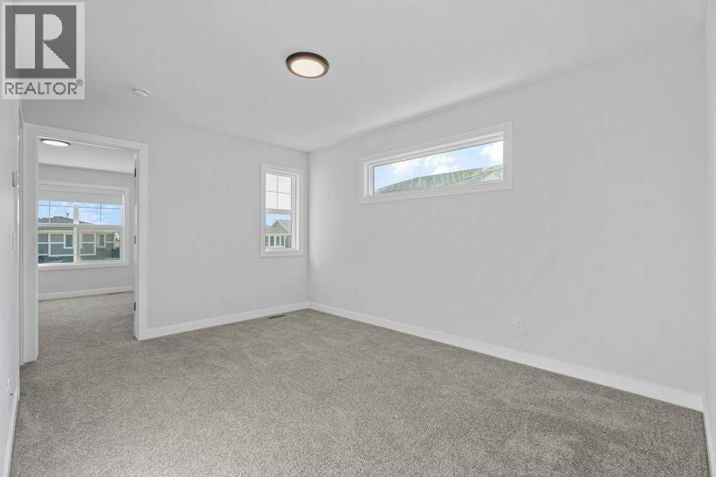 71 Ranchers View, Okotoks, Alberta  T1S 5R6 - Photo 32 - A2317784