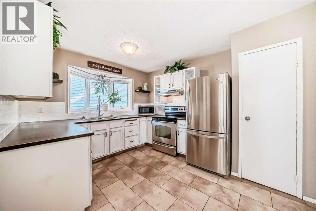 85 Rideau Close Sw, Airdrie, Alberta  T4B 1A7 - Photo 11 - A2310084