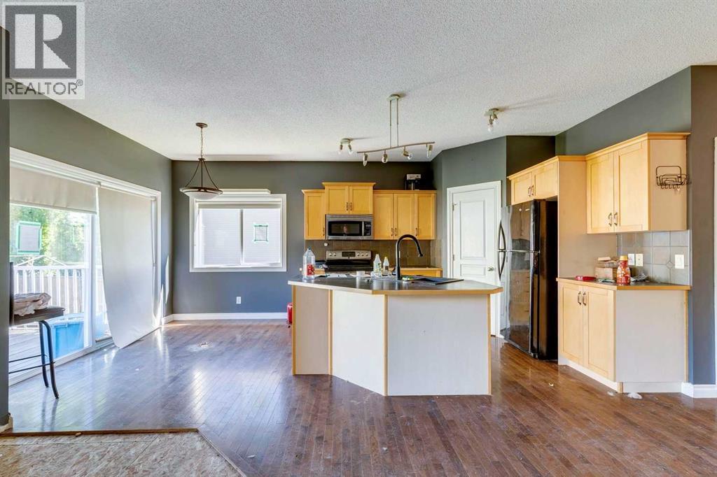 56 Crystal Shores Place, Okotoks, Alberta  T1S 2G3 - Photo 5 - A2306869