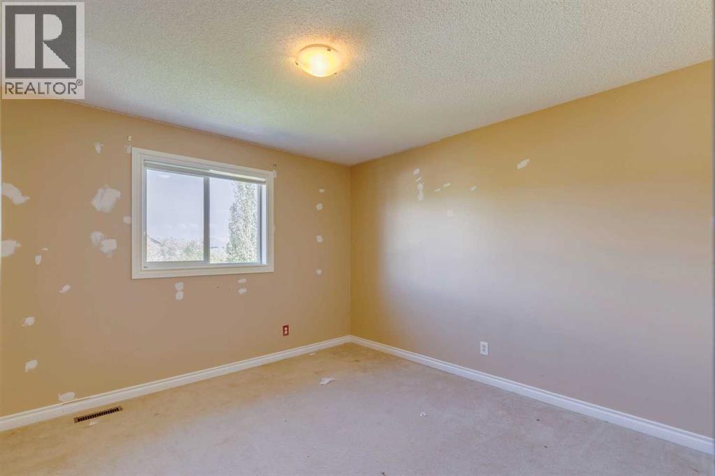 56 Crystal Shores Place, Okotoks, Alberta  T1S 2G3 - Photo 10 - A2306869