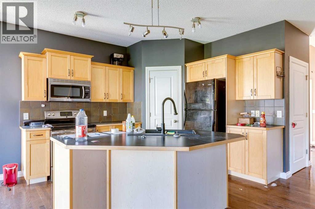 56 Crystal Shores Place, Okotoks, Alberta  T1S 2G3 - Photo 6 - A2306869