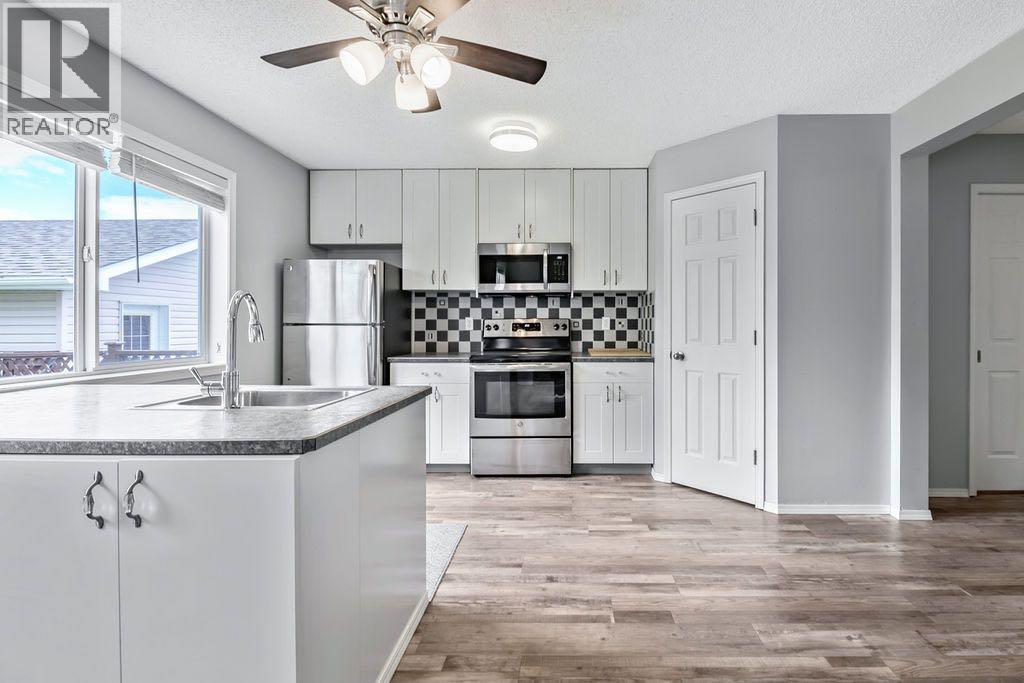 24 Cimarron Meadows Road, Okotoks, Alberta  T1S 1T1 - Photo 9 - A2326385