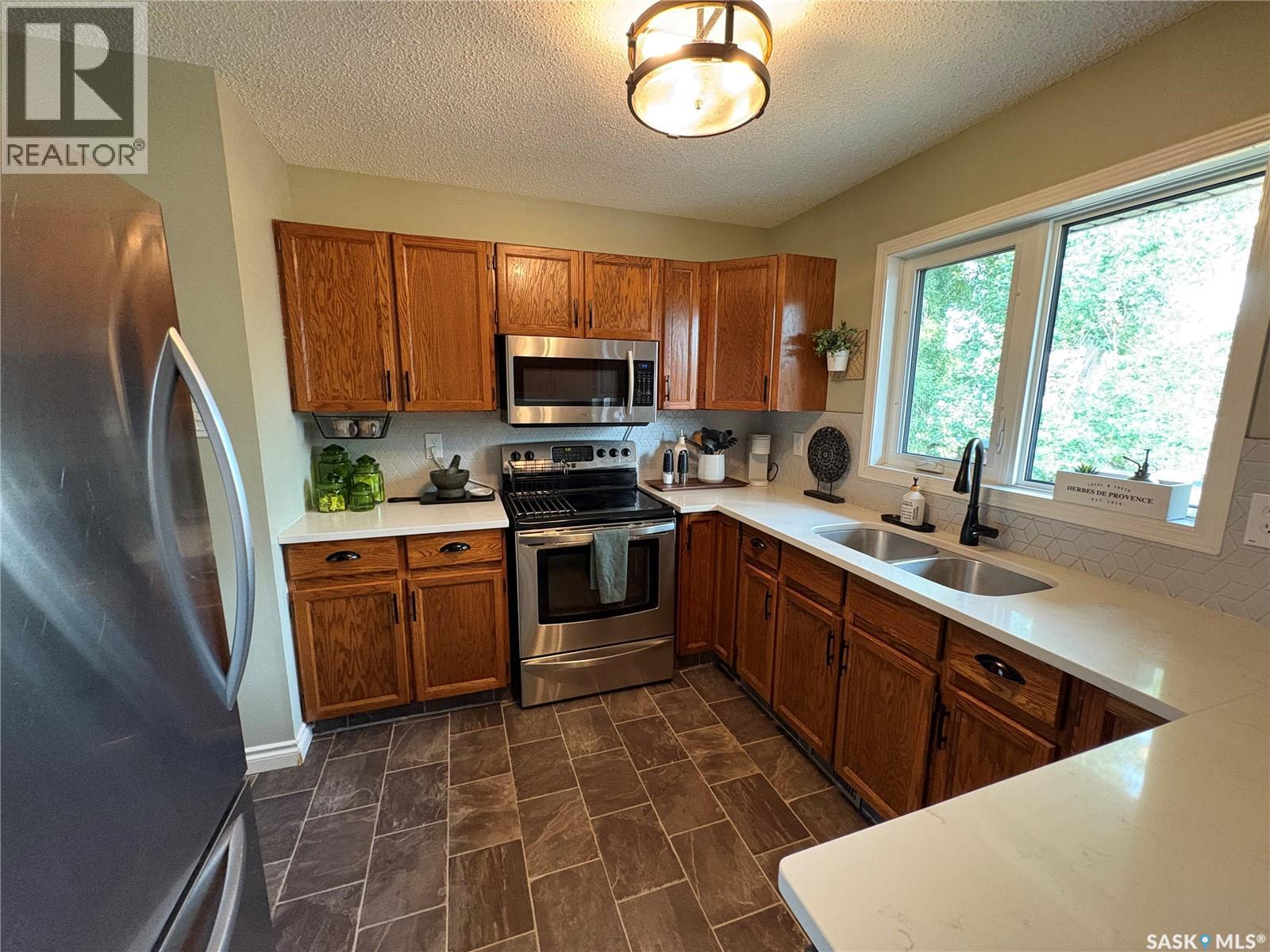 7202 Lawrence Drive, Regina, Saskatchewan  S4X 3X7 - Photo 12 - SK043832
