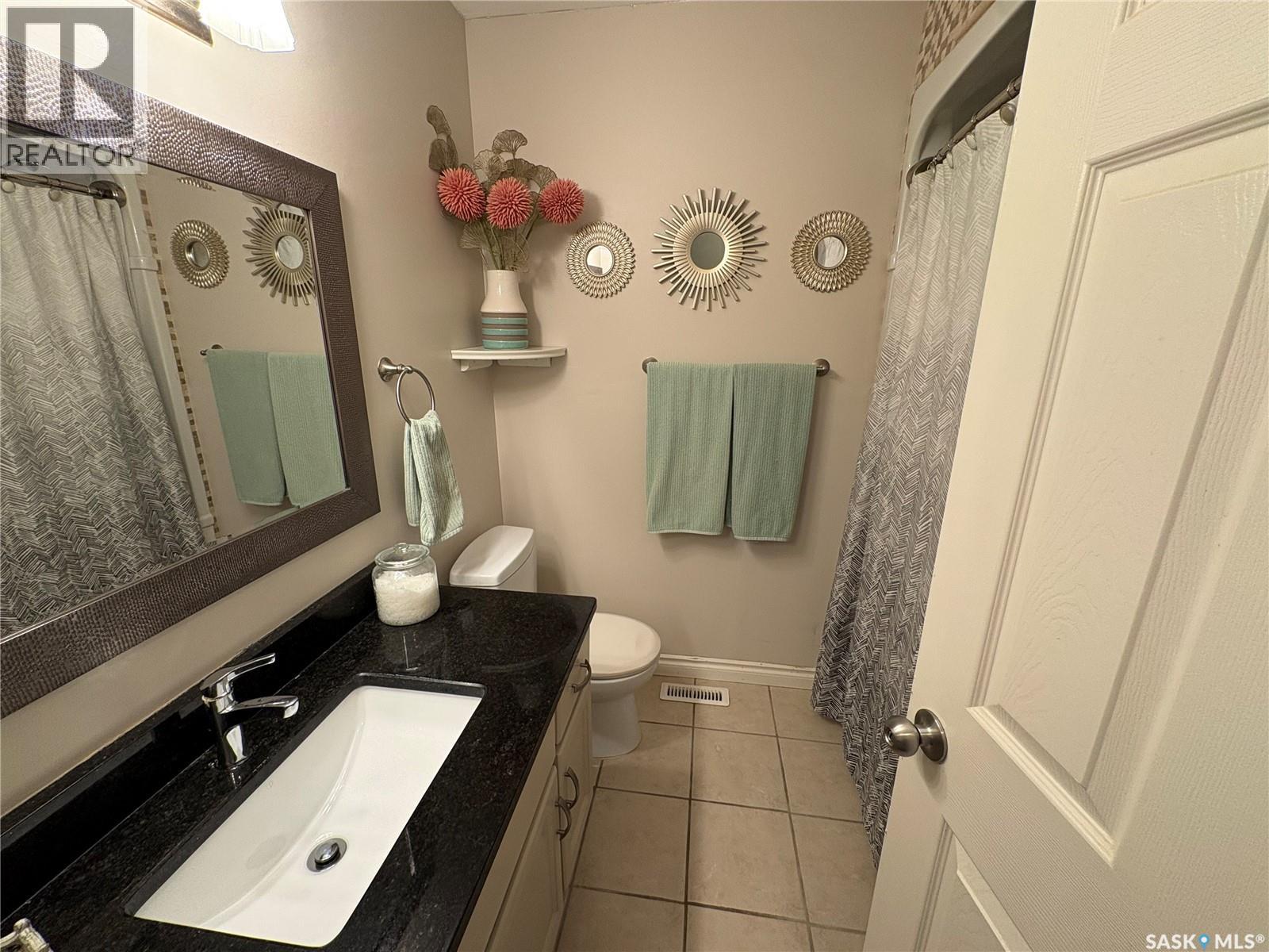 7202 Lawrence Drive, Regina, Saskatchewan  S4X 3X7 - Photo 28 - SK043832