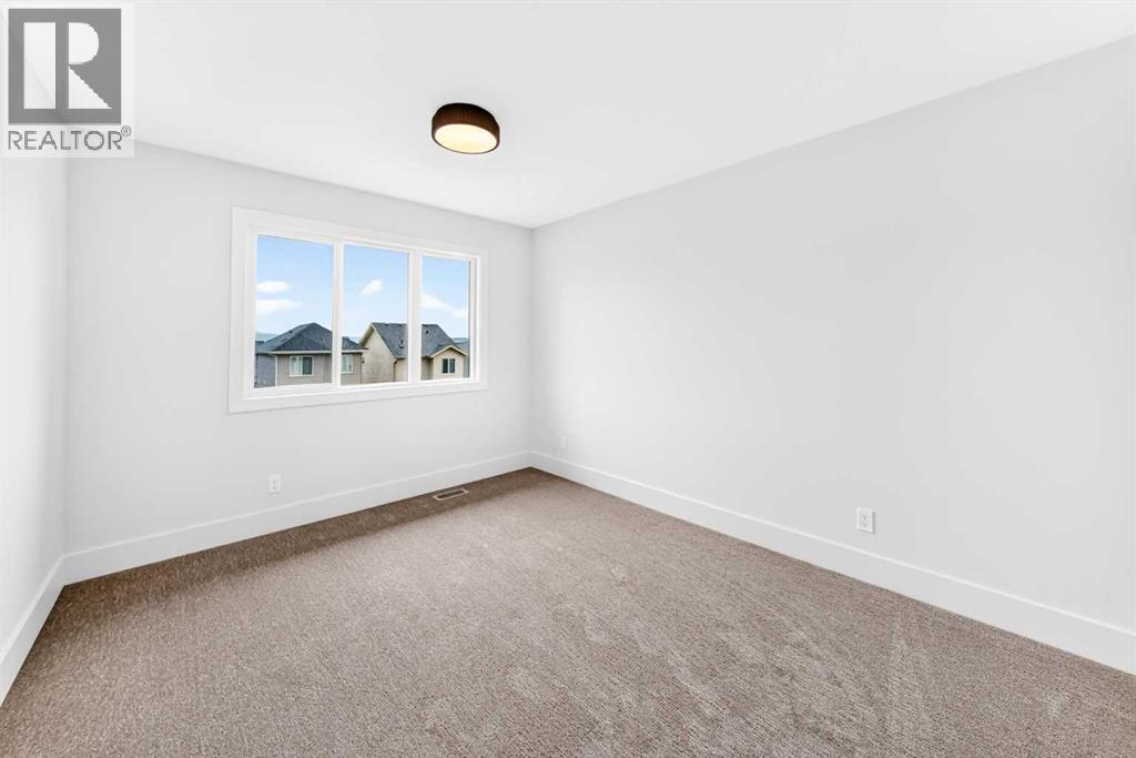 226 Greystone Boulevard, Cochrane, Alberta T4C 3K3 - Photo 25 - A2314990