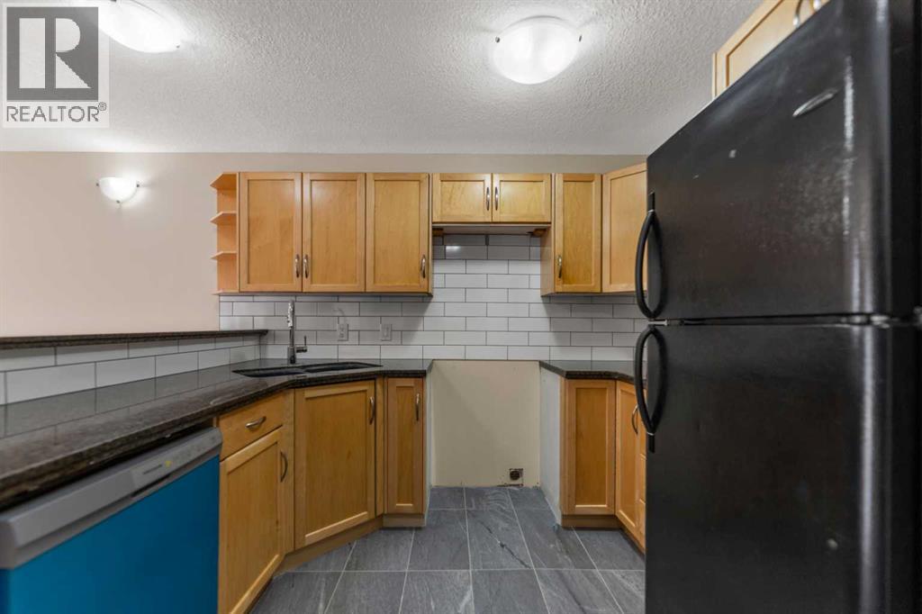 129, 46 Glamis Green Sw, Calgary, Alberta T2E 6S4 - Photo 12 - A2309322