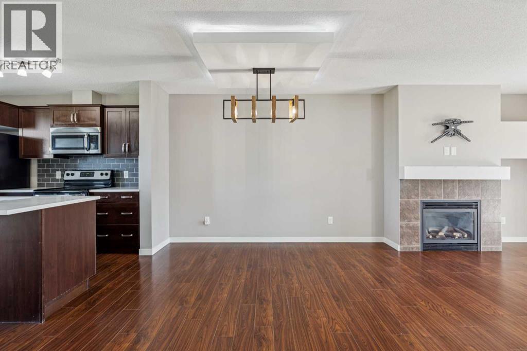 409 Copperpond Landing Se, Calgary, Alberta  T2Z 1G9 - Photo 7 - A2330177