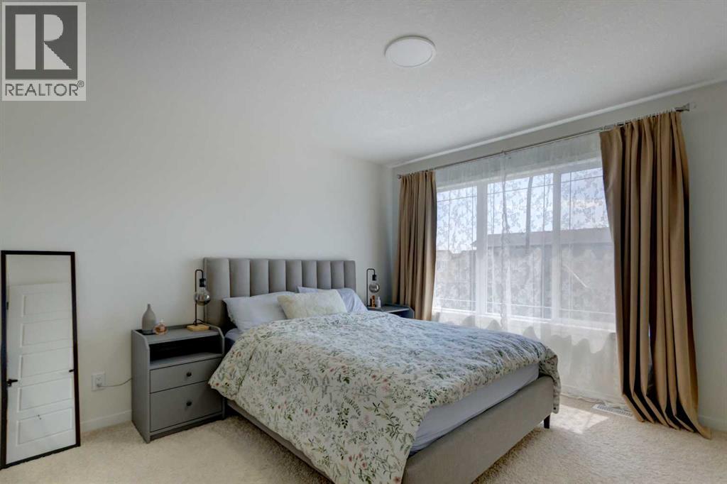 30 Creekside Manor Sw, Calgary, Alberta  T2X 5S2 - Photo 15 - A2321164