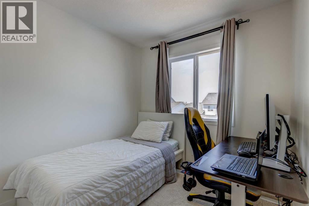 30 Creekside Manor Sw, Calgary, Alberta  T2X 5S2 - Photo 21 - A2321164