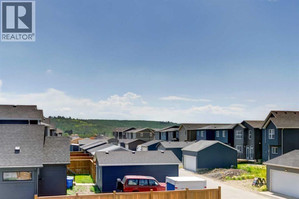 30 Creekside Manor Sw, Calgary, Alberta  T2X 5S2 - Photo 24 - A2321164