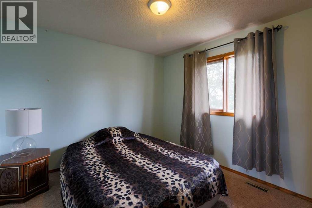 89 Athabasca Crescent, Crossfield, Alberta  T0M 0S0 - Photo 17 - A2329326