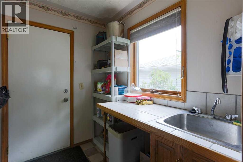 89 Athabasca Crescent, Crossfield, Alberta  T0M 0S0 - Photo 11 - A2329326