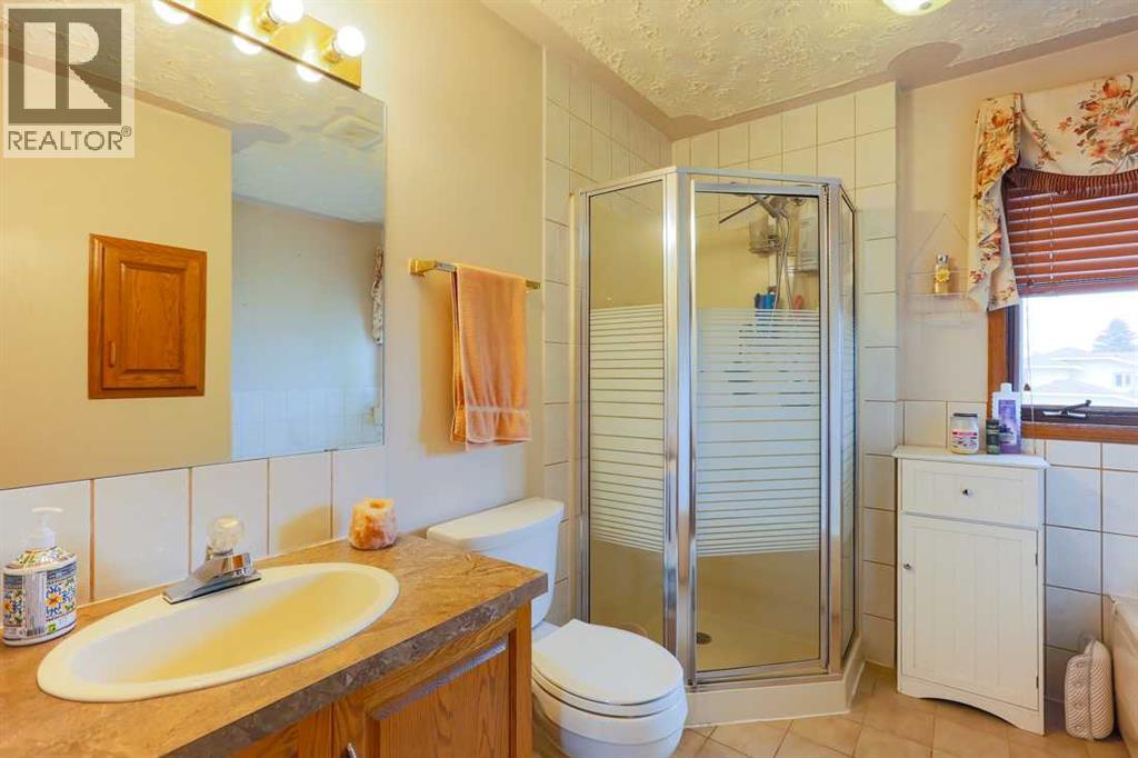89 Athabasca Crescent, Crossfield, Alberta  T0M 0S0 - Photo 16 - A2329326