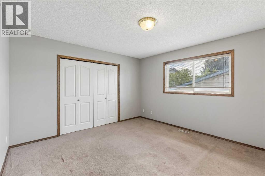 121 Quigley Drive, Cochrane, Alberta  T4C 1R1 - Photo 21 - A2317758