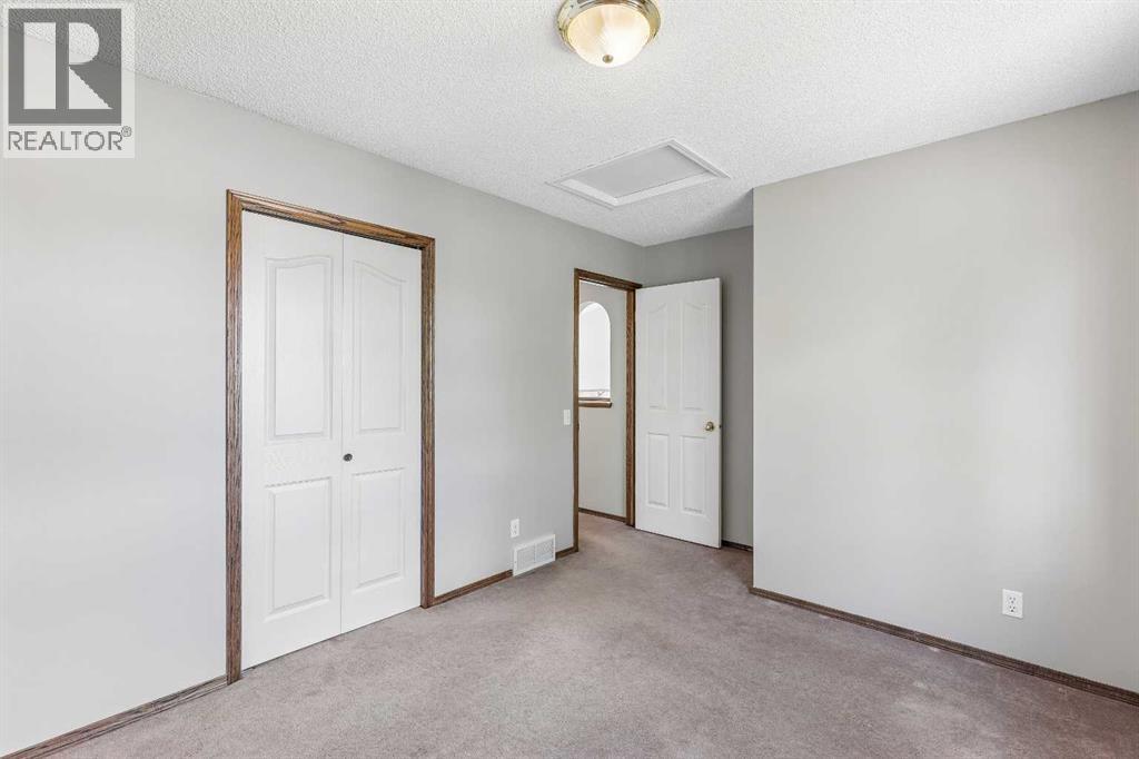 121 Quigley Drive, Cochrane, Alberta  T4C 1R1 - Photo 26 - A2317758