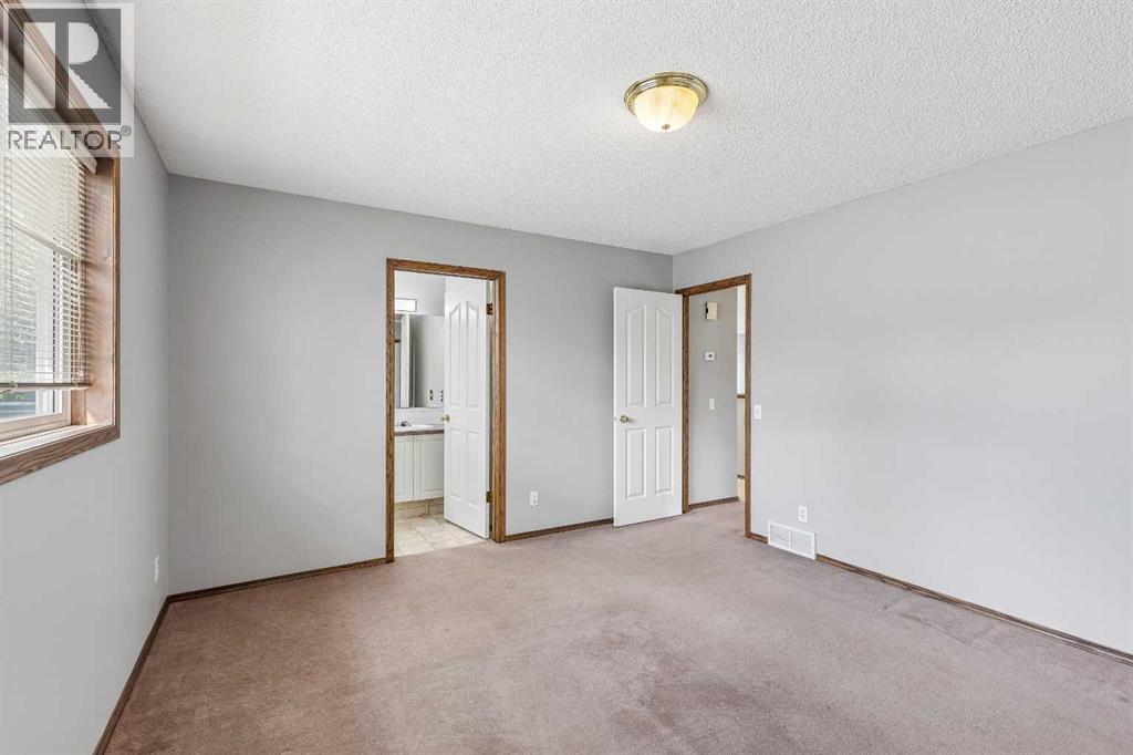 121 Quigley Drive, Cochrane, Alberta  T4C 1R1 - Photo 22 - A2317758