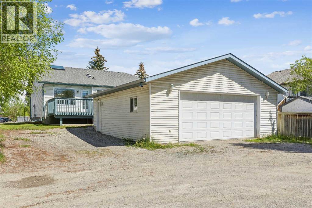 121 Quigley Drive, Cochrane, Alberta  T4C 1R1 - Photo 39 - A2317758