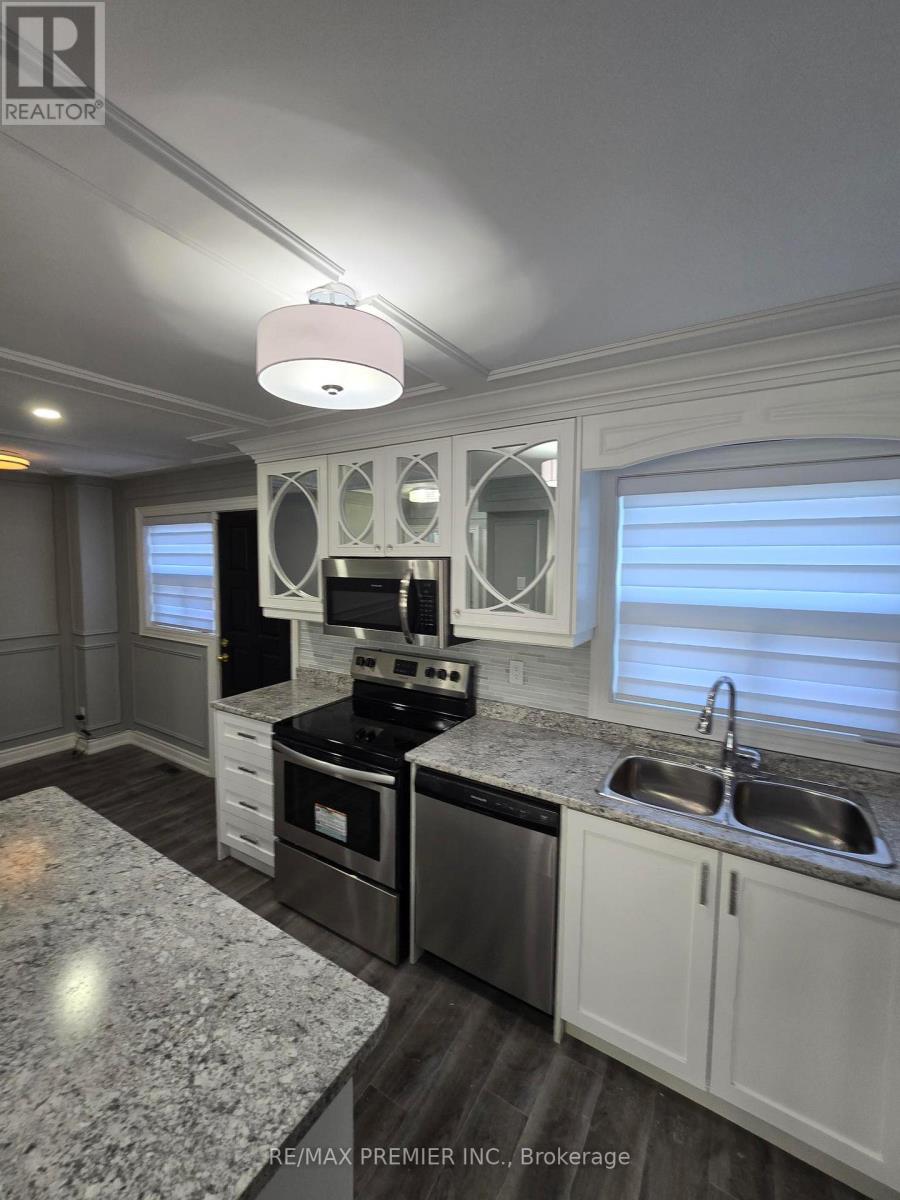 Main - 21 Elnathan Crescent, Toronto, Ontario  M9L 2G2 - Photo 6 - W13618814