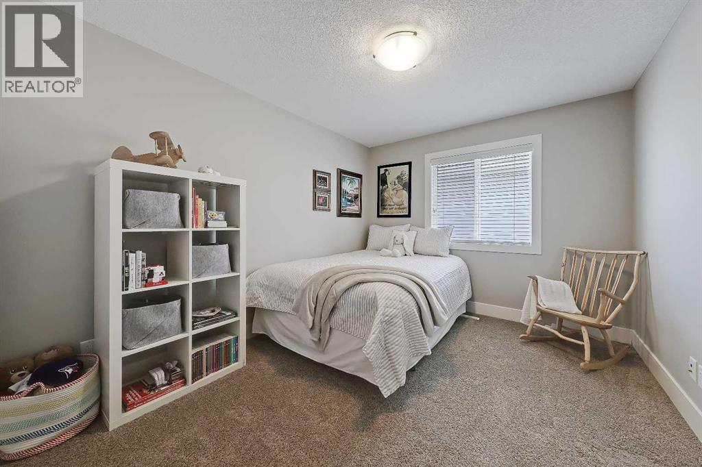 64 Heritage Green, Cochrane, Alberta  T4C 0L3 - Photo 32 - A2324432