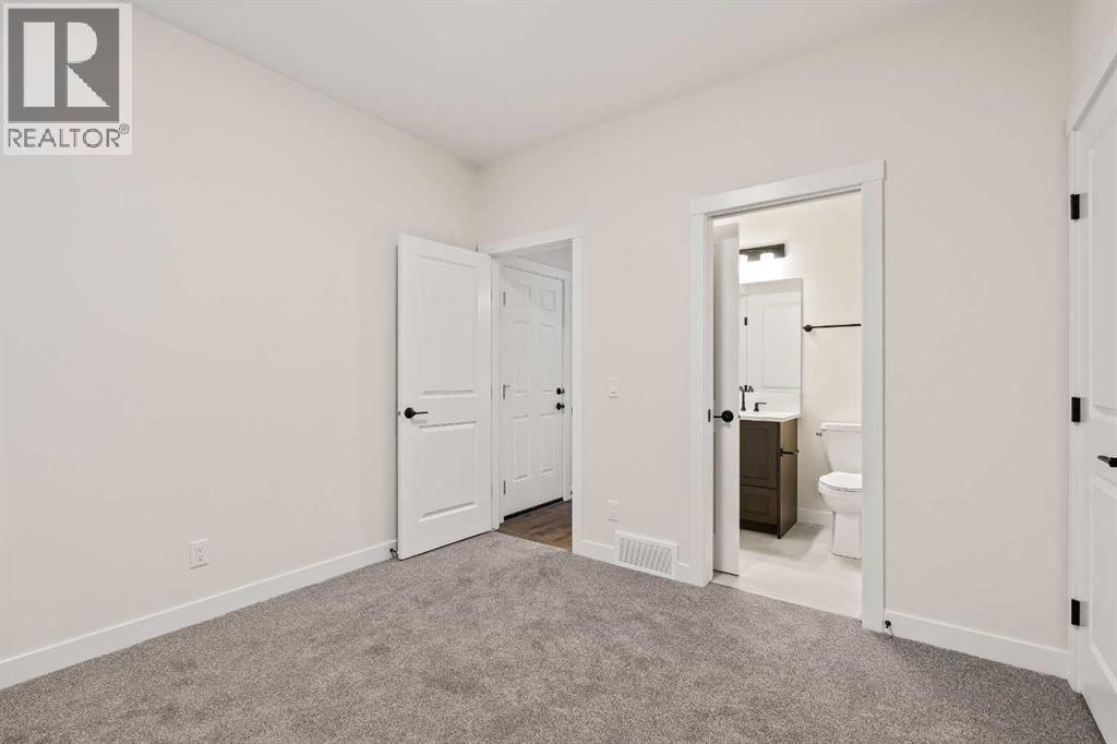 167 Lucas Gardens NW, Calgary, Alberta  T3P 2R9 - Photo 19 - A2326190