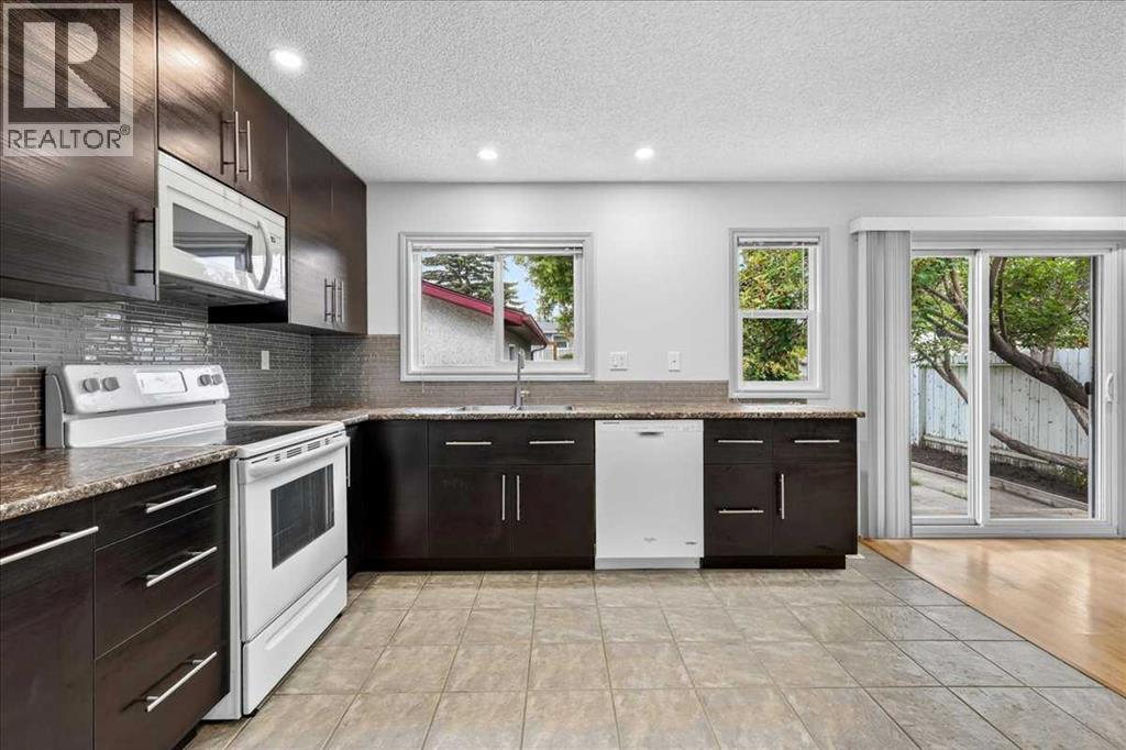 4707 Brockington Road NW, Calgary, Alberta  T2L 1R5 - Photo 10 - A2330736