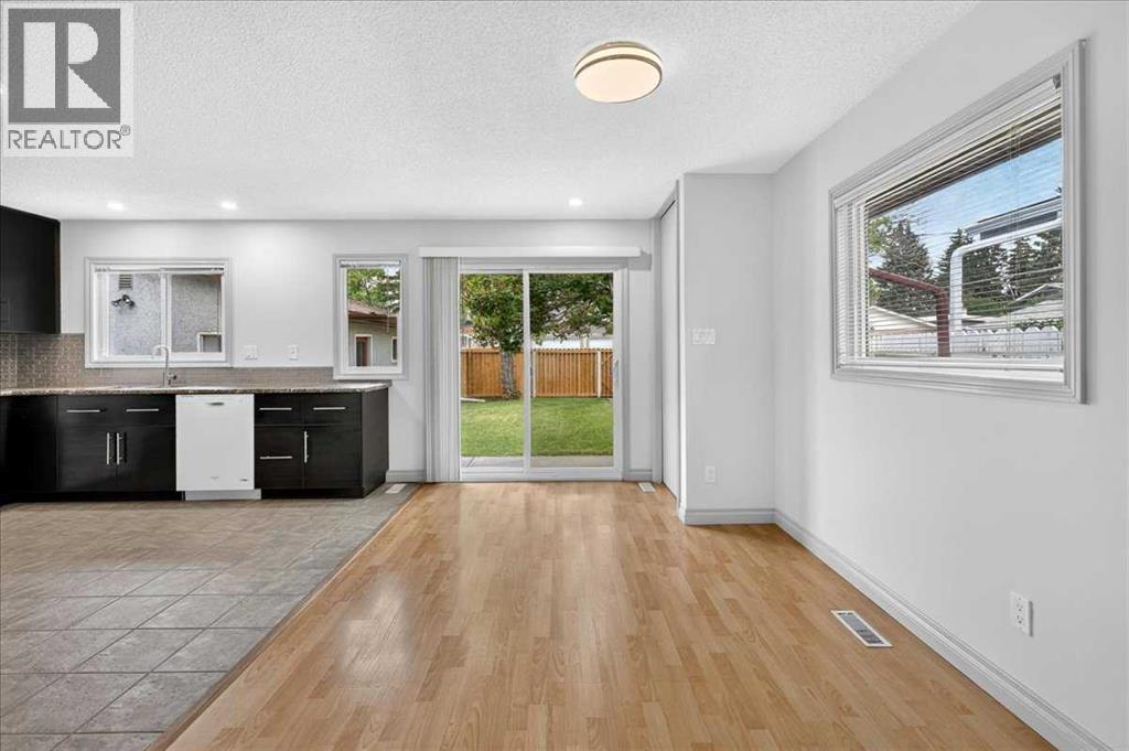 4707 Brockington Road NW, Calgary, Alberta  T2L 1R5 - Photo 7 - A2330736
