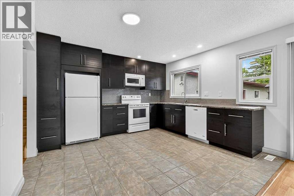4707 Brockington Road NW, Calgary, Alberta  T2L 1R5 - Photo 8 - A2330736