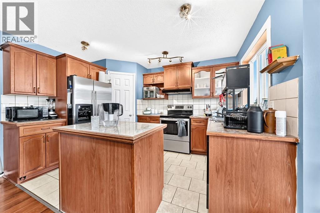 308 Taracove Estate Drive NE, Calgary, Alberta  T3J 5A1 - Photo 4 - A2333384