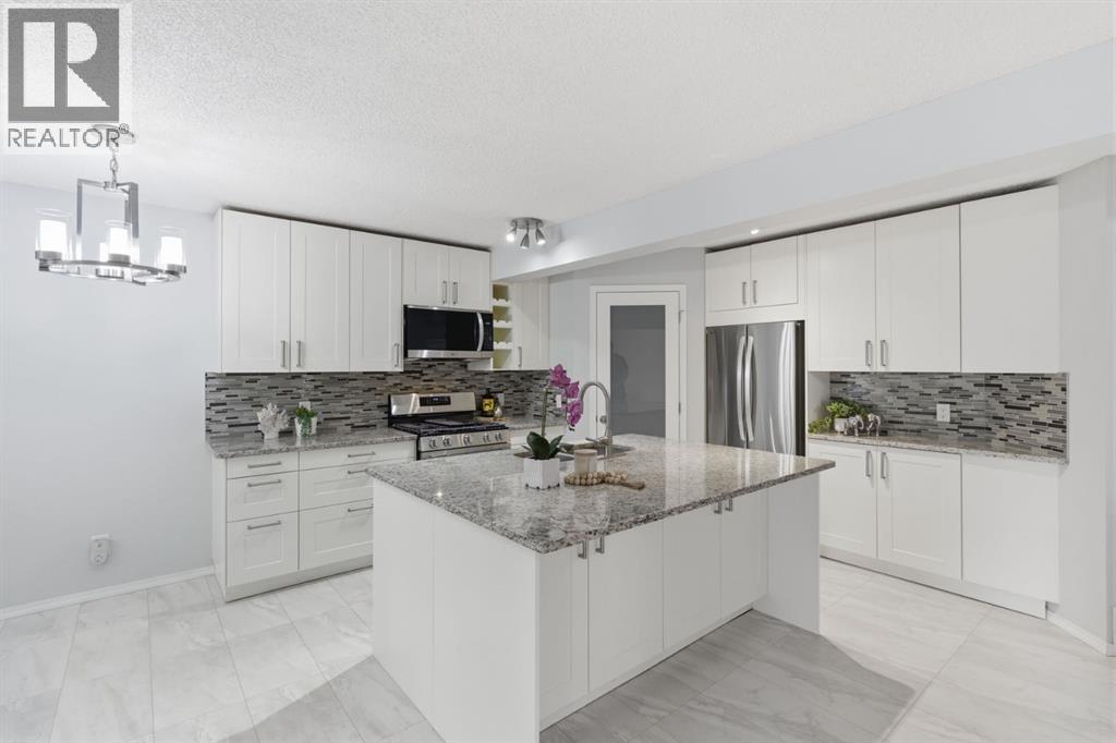 128 Valley Brook Circle NW, Calgary, Alberta  T3B 5S2 - Photo 7 - A2312468