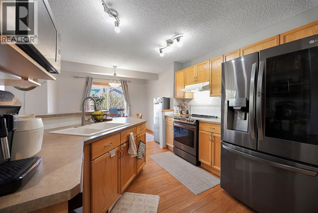 408 Bridlewood Court Sw, Calgary, Alberta  T2Y 3Z3 - Photo 10 - A2313224