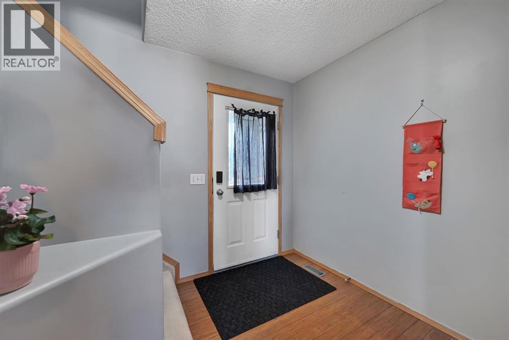 408 Bridlewood Court Sw, Calgary, Alberta  T2Y 3Z3 - Photo 5 - A2313224