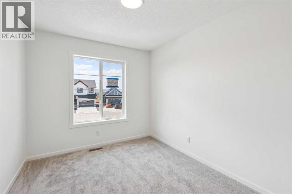 28 Southborough Bay, Cochrane, Alberta  T4C 3J8 - Photo 25 - A2325589