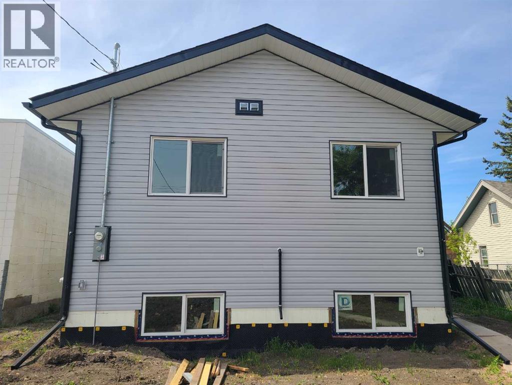 10007 99 Street, Sexsmith, Alberta  T0H 3C0 - Photo 33 - A2316744