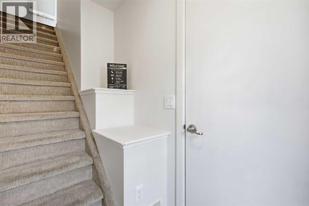 220 Covecreek Circle NE, Calgary, Alberta T3K 0W6 - Photo 4 - A2317858