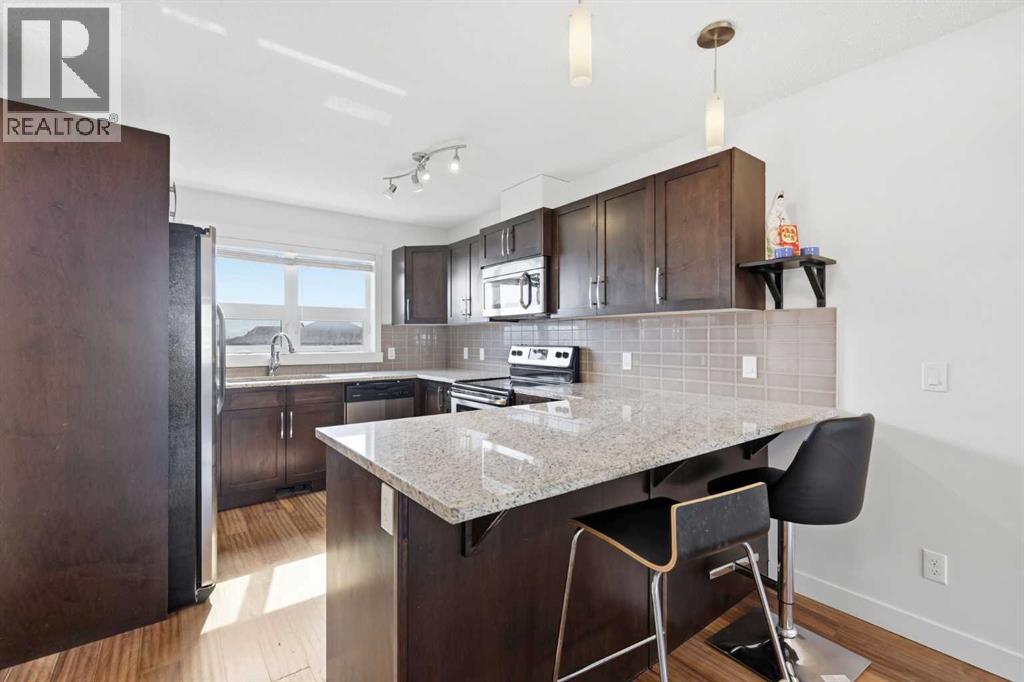 220 Covecreek Circle NE, Calgary, Alberta T3K 0W6 - Photo 6 - A2317858