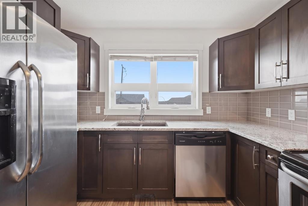 220 Covecreek Circle NE, Calgary, Alberta T3K 0W6 - Photo 7 - A2317858