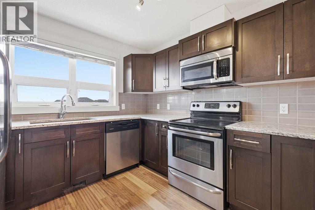 220 Covecreek Circle NE, Calgary, Alberta T3K 0W6 - Photo 8 - A2317858