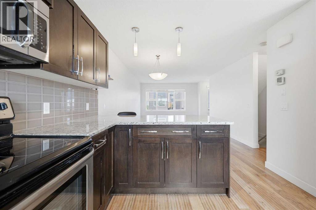 220 Covecreek Circle NE, Calgary, Alberta T3K 0W6 - Photo 11 - A2317858