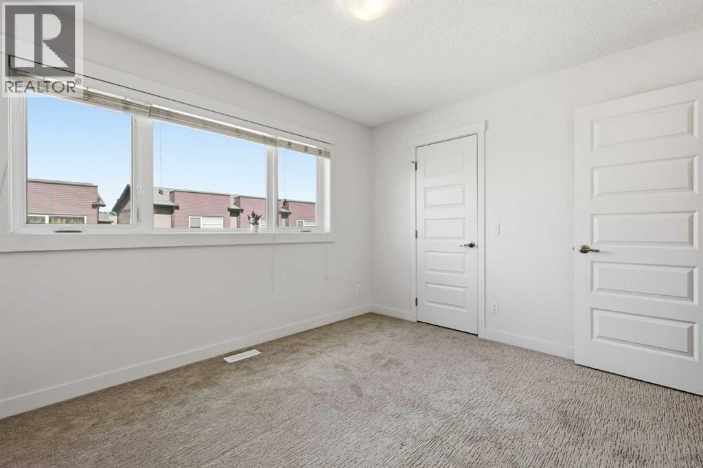 220 Covecreek Circle NE, Calgary, Alberta T3K 0W6 - Photo 17 - A2317858