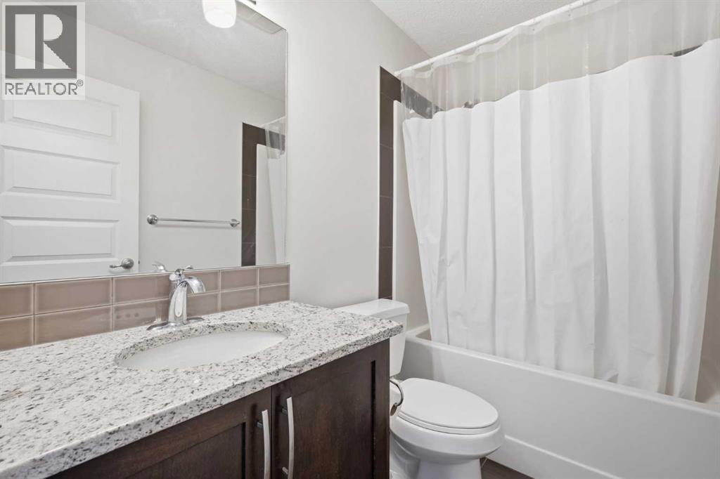 220 Covecreek Circle NE, Calgary, Alberta T3K 0W6 - Photo 20 - A2317858